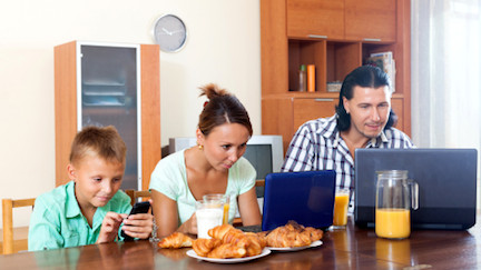 couple with teenager son  during breakfast