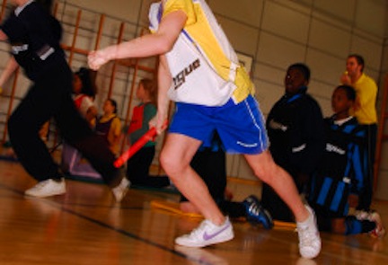School pupils taking part in a inter school indoor athletics event London UK